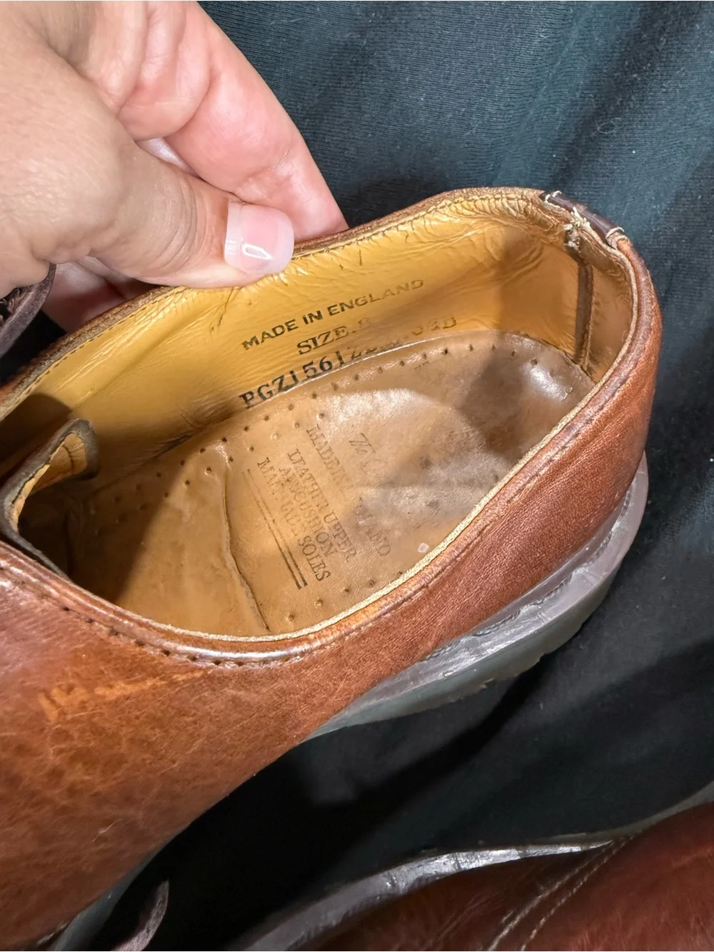 Vintage Dr. Martens Made in England (MIE) brown leather shoes.